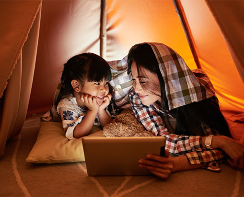 PRK - Unsurpassed Results Mother and daughter looking at tablet