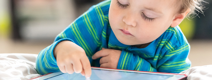 Child having screen time on a tablet